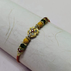 Radiant AD Crystals and Beads Studded Rakhi