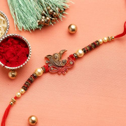 Ganapati Rustic Finish Rakhi with Pearls and Golden Rings
