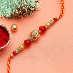 Sobre Golden Ball Rakhi with Beads and Rings
