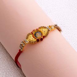 AD Embellished with Ganeshji Rakhi