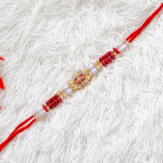 AD Studded Rakhi with Pearls and Beads AD Studded Rakhi with Pearls and Beads