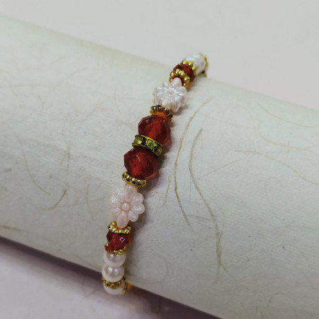 Beautiful Colored Beads and Pearls Work Rakhi