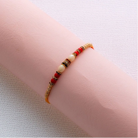 Beautiful Diamonds Rakhi with Beads Embellishments