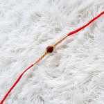 Beautiful Pearl Rakhi with Rudraksh Accent Beautiful Pearl Rakhi with Rudraksh Accent