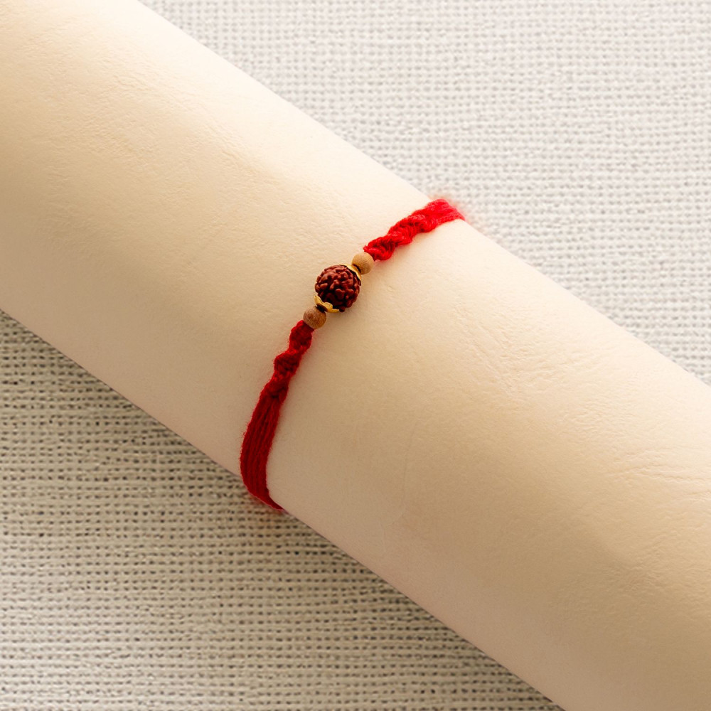 Blessed Rudraksh Rakhi with Wooden Beads Blessed Rudraksh Rakhi with Wooden Beads