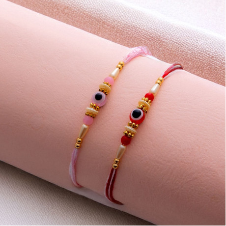 Chic Pair of Evil Eye Rakhis with Pearls and Beads