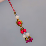 Colored Beads and Pearls Lumba Rakhi Colored Beads and Pearls Lumba Rakhi