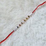 Dazzling Pearls with Multicolor AD Rakhi