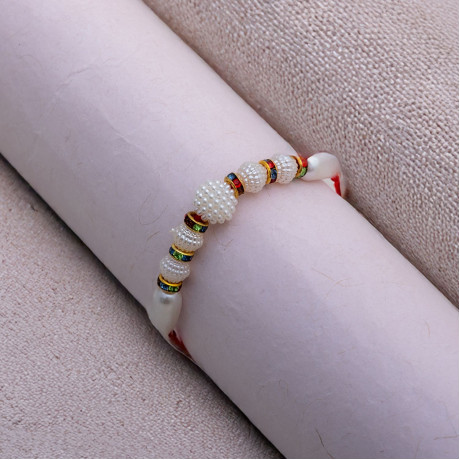 Dazzling Pearls with Multicolor AD Rakhi