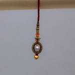 Delicate Lumba Rakhi with Pearl Charms