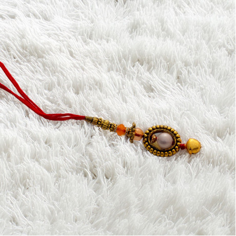 Delicate Lumba Rakhi with Pearl Charms
