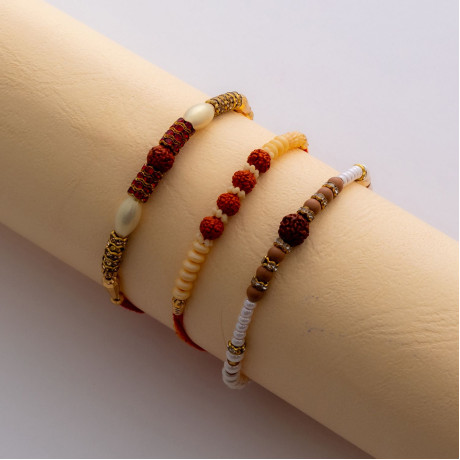Delightful Set of 3 Rakhis with Pearls, AD and Rudraksh