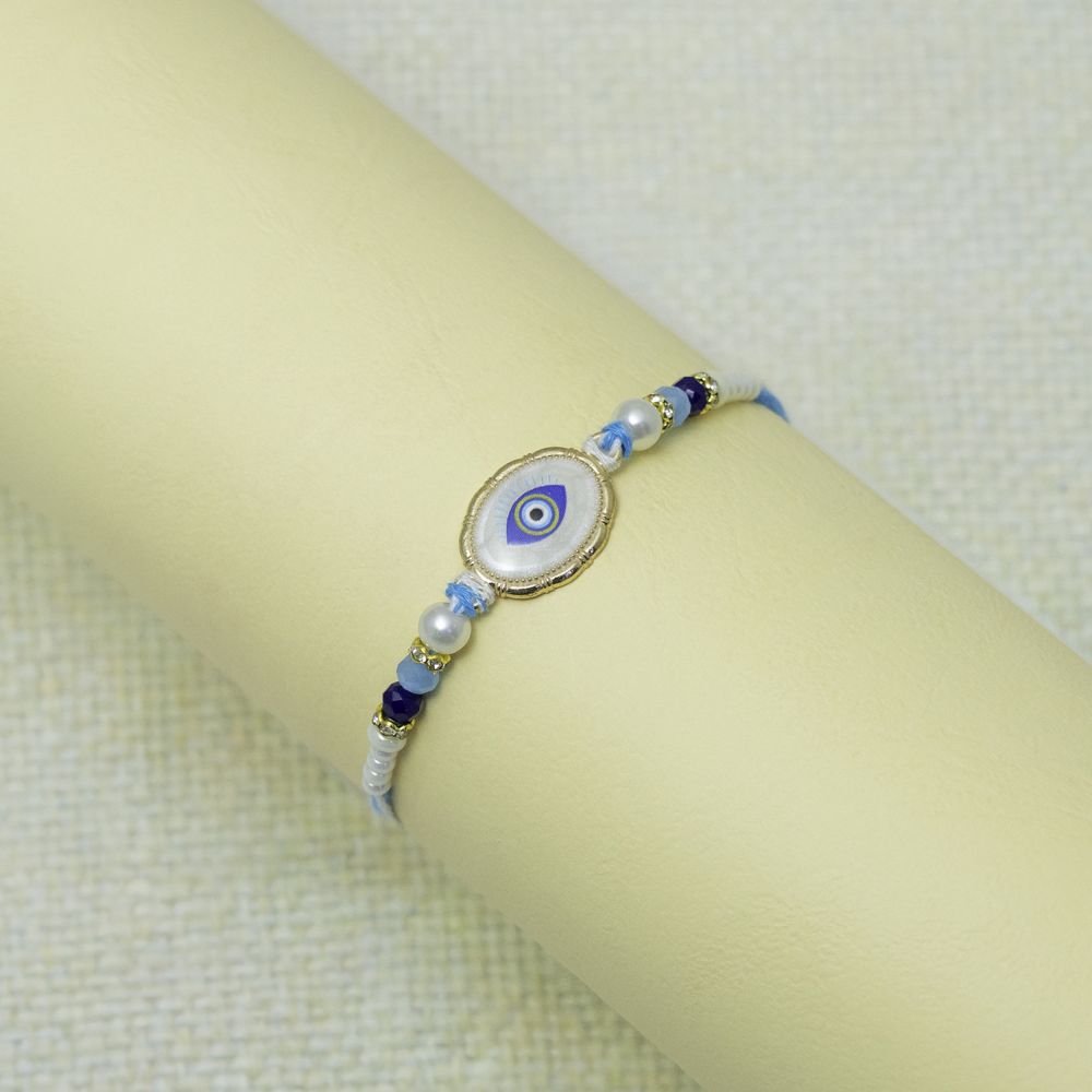 Designer Evil Eye Rakhi with Beads & Pearl Work Designer Evil Eye Rakhi with Beads & Pearl Work