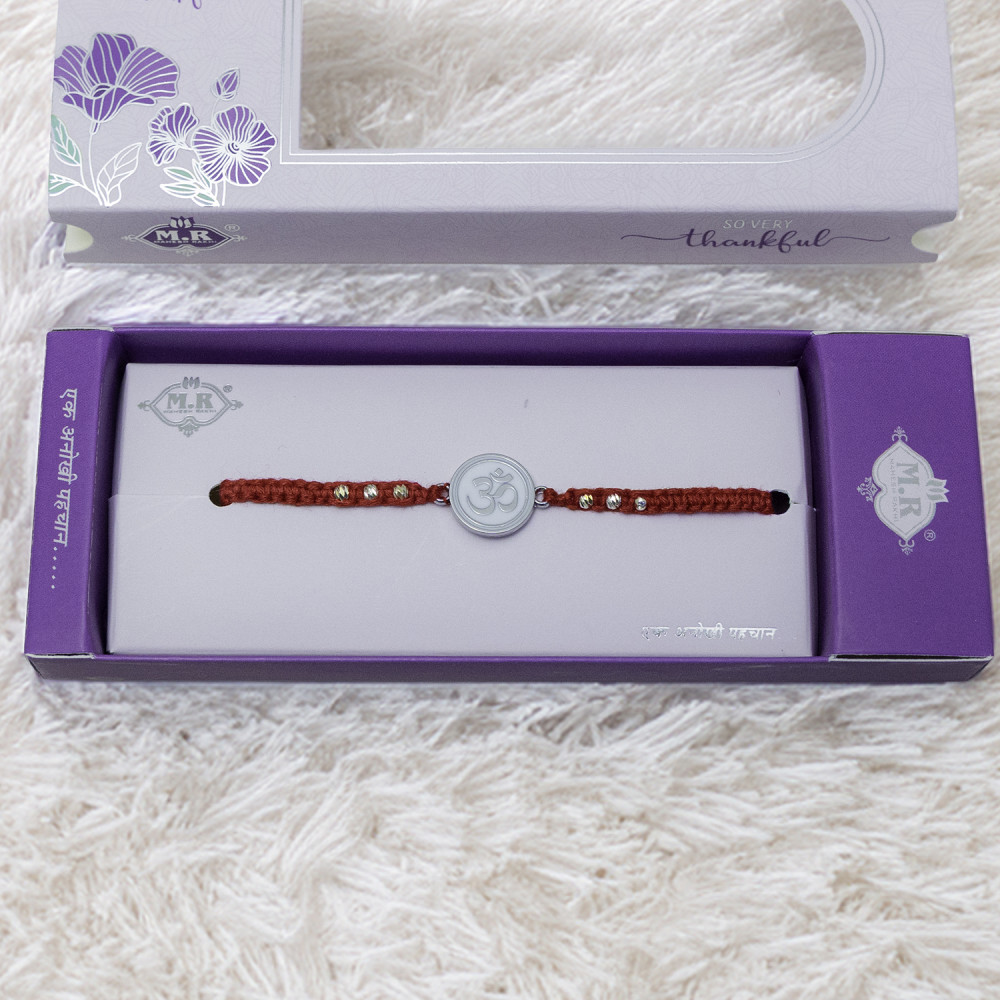 Devotional Grace Silver OM Rakhi Devotional Grace Silver OM Rakhi