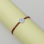 Devotional Grace Silver OM Rakhi Devotional Grace Silver OM Rakhi