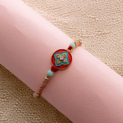 Elegant Enamel Rakhi with Sparkling Diamonds