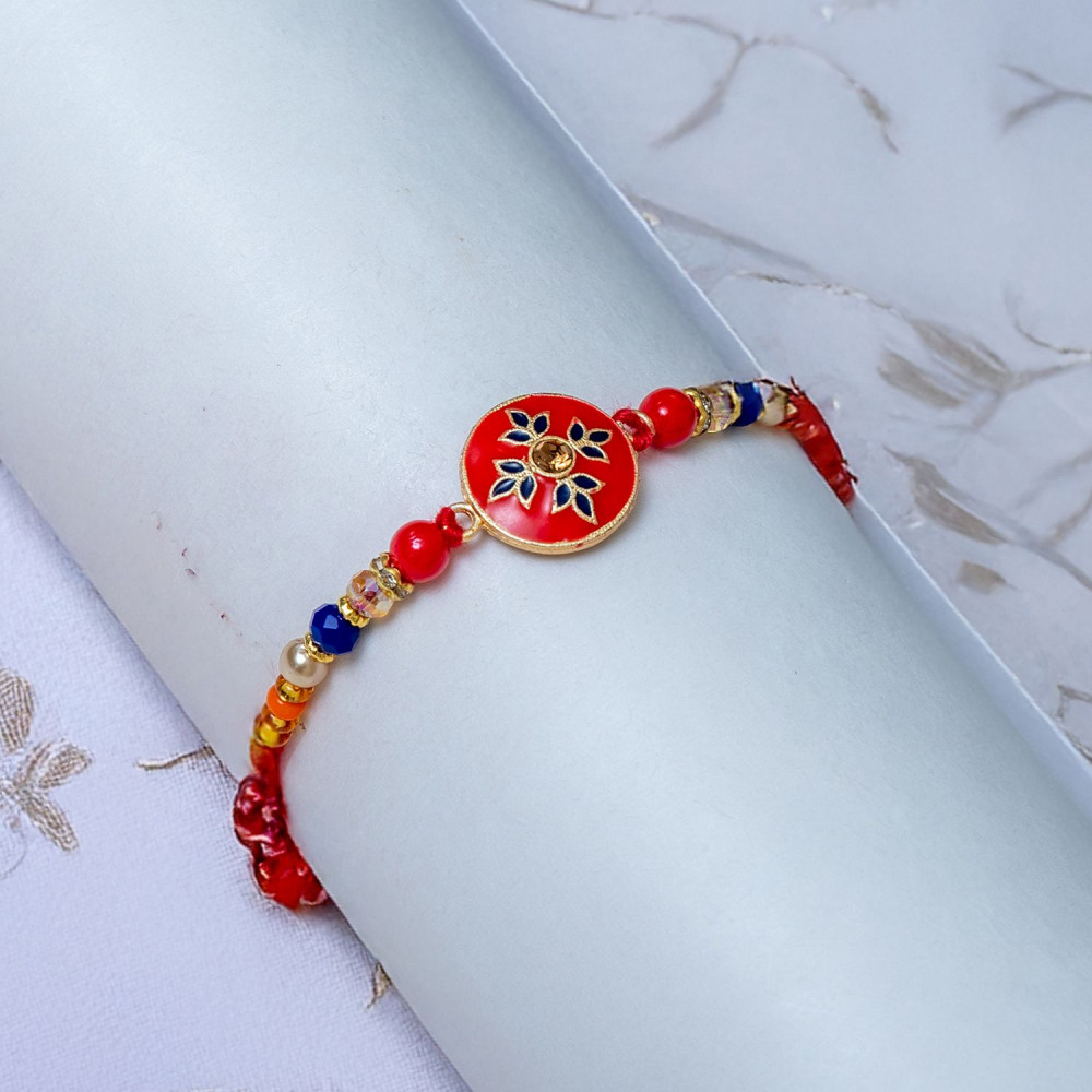 Elegant Meenakari Rakhi - Handcrafted Beauty Elegant Meenakari Rakhi - Handcrafted Beauty
