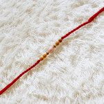 Ethnic Pearl Rakhi with Beads Ethnic Pearl Rakhi with Beads