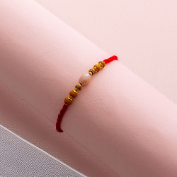 Ethnic Pearl Rakhi with Beads Ethnic Pearl Rakhi with Beads