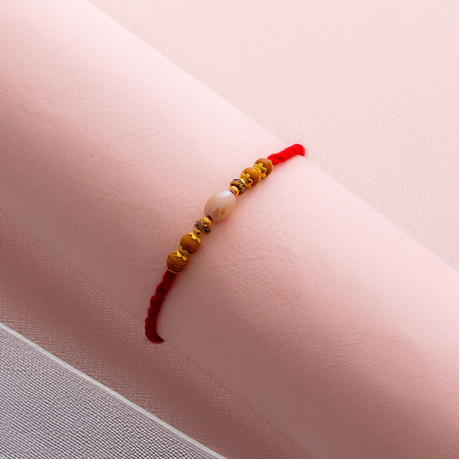 Ethnic Pearl Rakhi with Beads Ethnic Pearl Rakhi with Beads