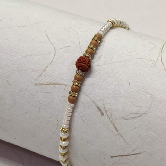 Exclusive Pearls Rakhi with Rudraksha Exclusive Pearls Rakhi with Rudraksha