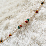 Fabulous Pearls Stones and AD Rakhi
