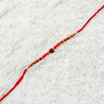 Fancy Beads Rakhi with Holy Rudraksh Fancy Beads Rakhi with Holy Rudraksh