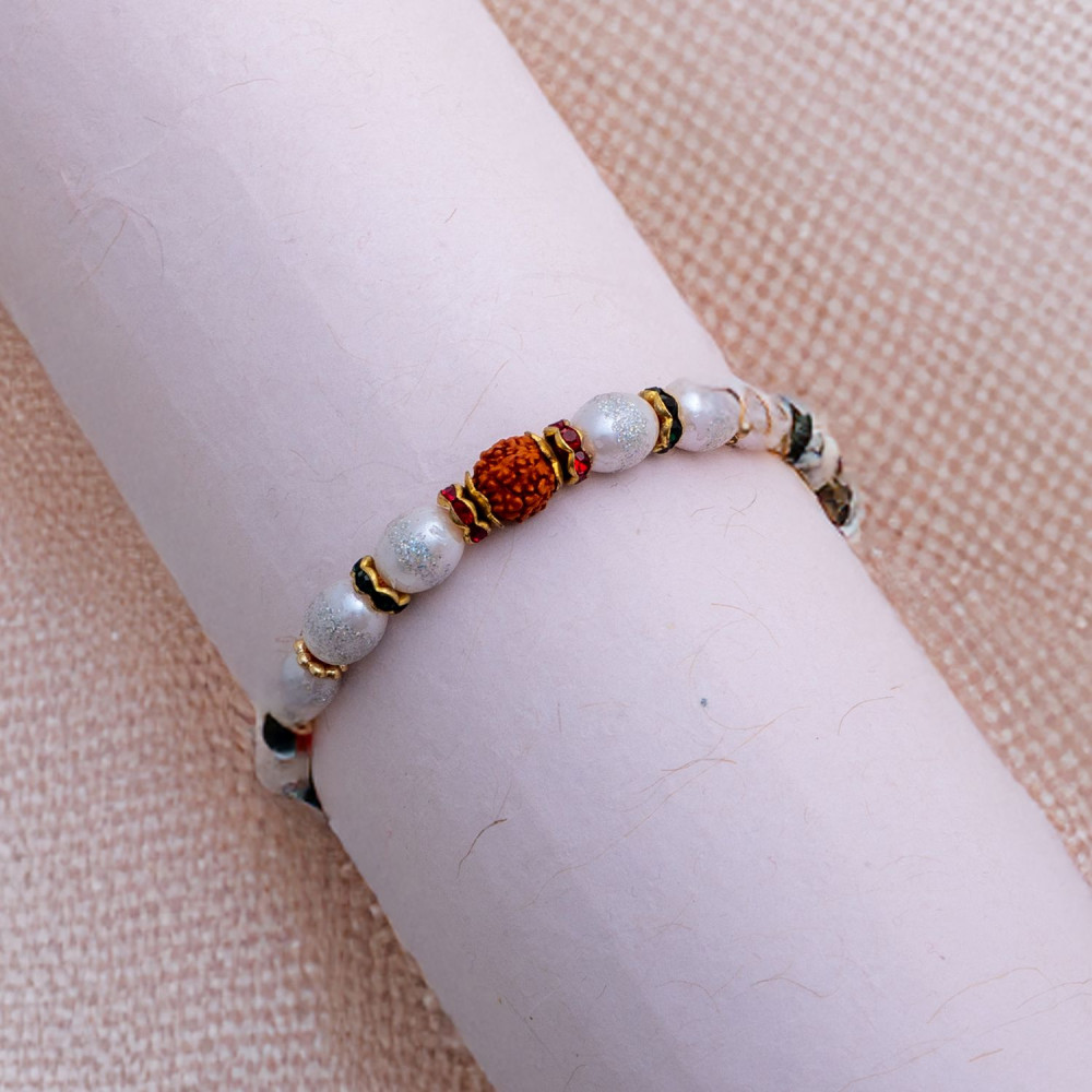 Fancy Rudraksh with Pearls and AD Rakhi Fancy Rudraksh with Pearls and AD Rakhi