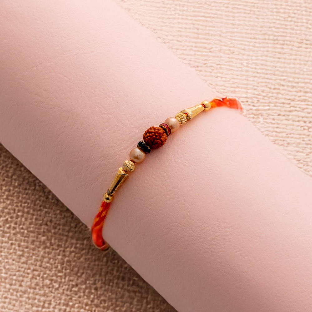 Fancy Rudraksha, Pearls and Beads Rakhi Fancy Rudraksha, Pearls and Beads Rakhi