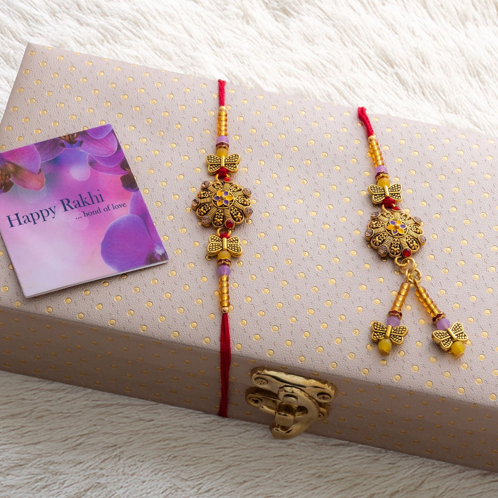 Festive Bhaiya Bhabhi Rakhi Set in Decorative Chest Festive Bhaiya Bhabhi Rakhi Set in Decorative Chest