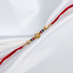 Floral Motif with Multicolor Beads Rakhi Floral Motif with Multicolor Beads Rakhi