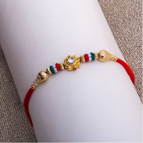 Floral Motif with Multicolor Beads Rakhi Floral Motif with Multicolor Beads Rakhi