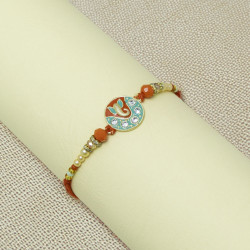 Ganesha Enamelled Rakhi with Traditional Beadwork