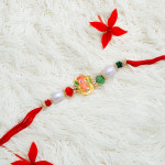 Ganeshji Rakhi with Pearls and Multicolor Beads Ganeshji Rakhi with Pearls and Multicolor Beads