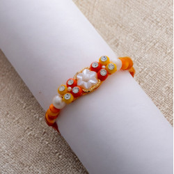 Glowing Pearls AD and Beads Rakhi
