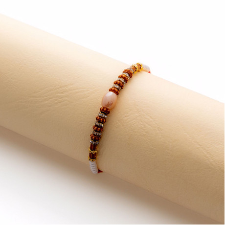 Gorgeous Pearl Rakhi with Fancy Beads