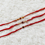 Graceful Set of 3 Rakhis with Rudraksh, Beads and Pearls