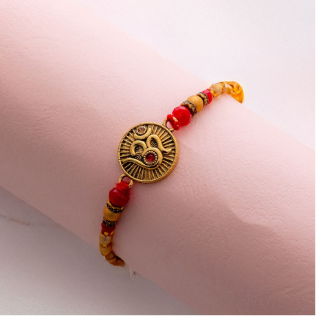 Handcrafted Beads Rakhi with Metallic Studded OM