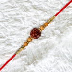 Handcrafted Rudraksh Rakhi with Kumkum and Chawal Handcrafted Rudraksh Rakhi with Kumkum and Chawal