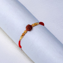 Handcrafted Rudraksh Rakhi with Kumkum and Chawal