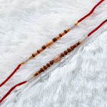 Handcrafted Set of 2 Rakhis with Pearls and Beads Handcrafted Set of 2 Rakhis with Pearls and Beads