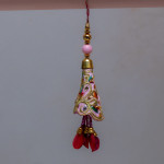 Handmade Pink Lumba Rakhi with Thread Work Handmade Pink Lumba Rakhi with Thread Work