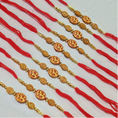 Lovely Set of 10 OM Rakhis with Golden Beads