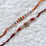 Lovely Set of 2 Rakhis with Pearls and Beads Lovely Set of 2 Rakhis with Pearls and Beads
