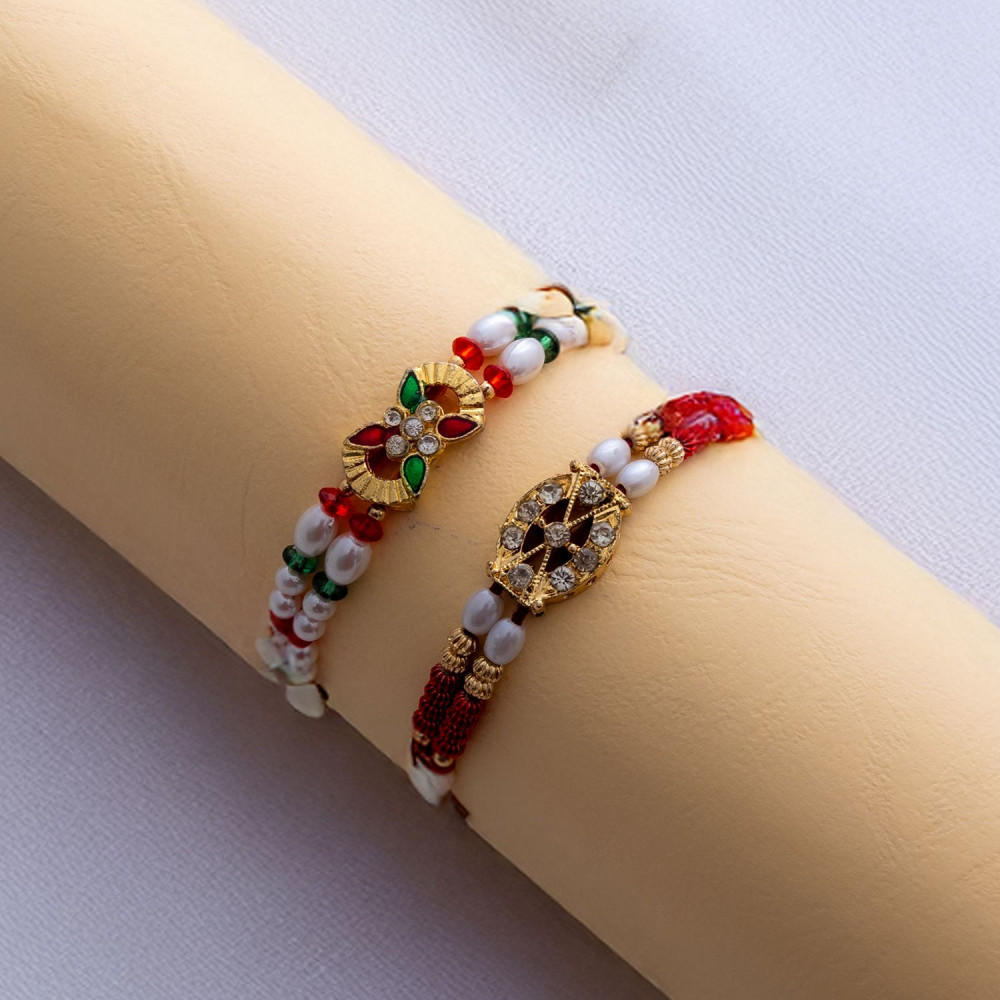 Lovely Set of 2 Rakhis with Pearls and Beads Lovely Set of 2 Rakhis with Pearls and Beads