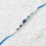Luxury Pearl and Beads Rakhi with Evil Eye
