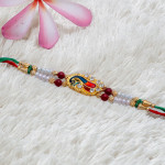 Meena Work Peacock Rakhi with Pearls and Beads Meena Work Peacock Rakhi with Pearls and Beads
