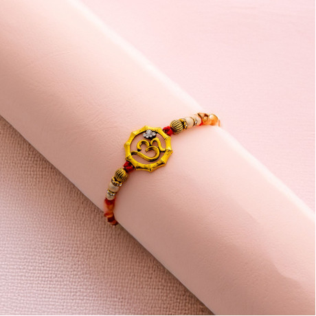 Metallic  OM Motif Rakhi with Pearls, Beads and AD