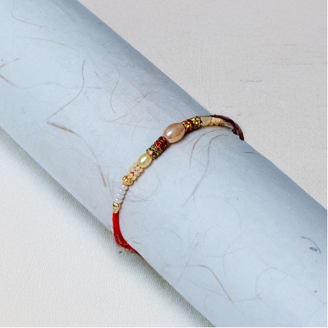 Minimalist Pearl Rakhi - Sleek and Contemporary