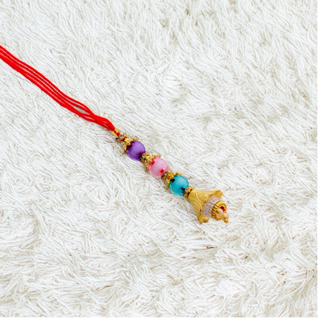 Multicolor Crystals and Beads Studded Lumba Rakhi Multicolor Crystals and Beads Studded Lumba Rakhi